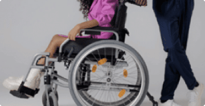 A little girl on a wheelchair